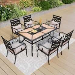 7-Piece Patio Dining Set Patch Wood-Grain Table And Stylish Steel Chairs